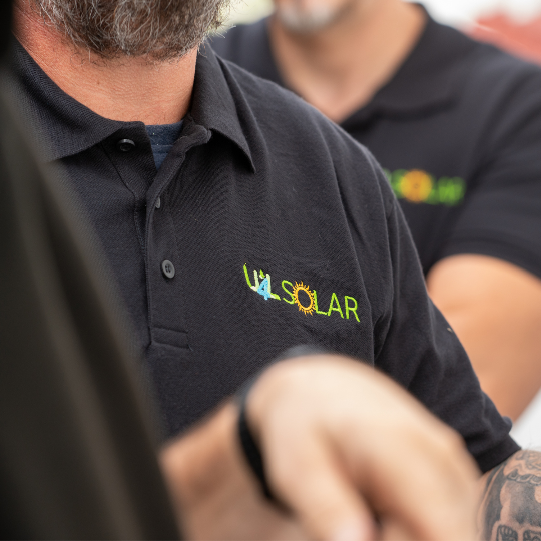 A close-up shot of the U4L Solar team at work